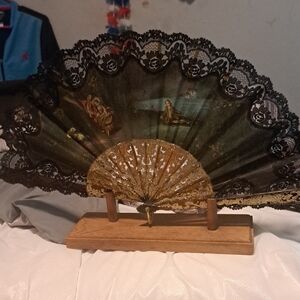 Elegant Black and Gold Decorative Fan
